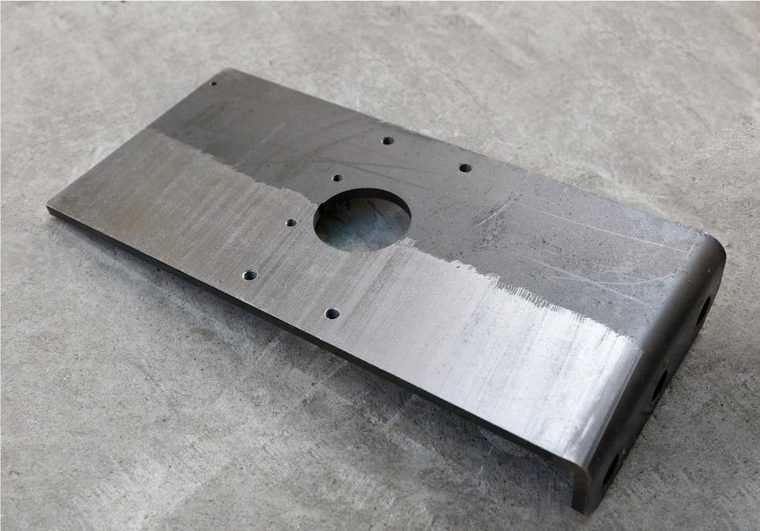 Metal fixture and solder pallet tooling on a production bench